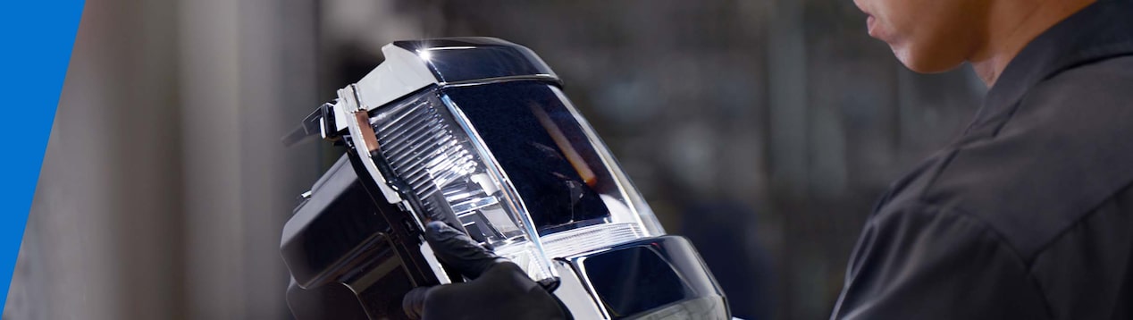 GM Technician Inspecting a Taillight