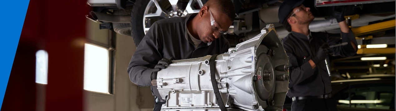 GM Technician Inspecting a Transmission