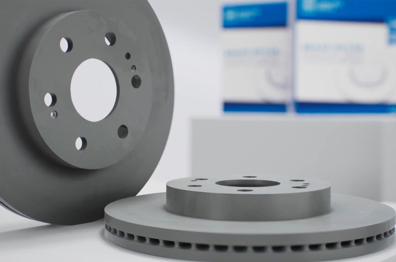 GM Genuine Brake Rotor Discs on Display with Packaging in Background